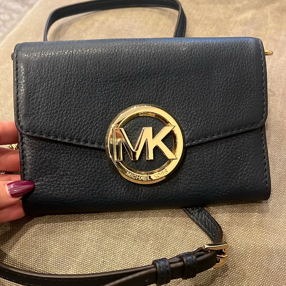 Michael Kors wallet on a chain crossbody